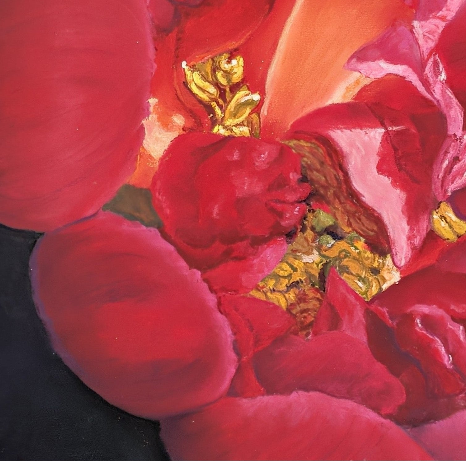 Framed painting of a red flower with a wooden frame